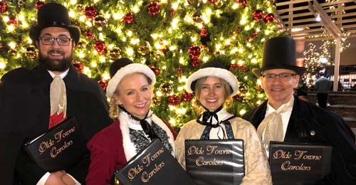 Victorian Christmas carolers